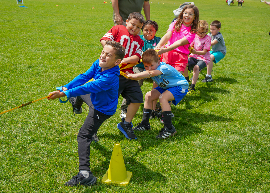 Students play tug of war