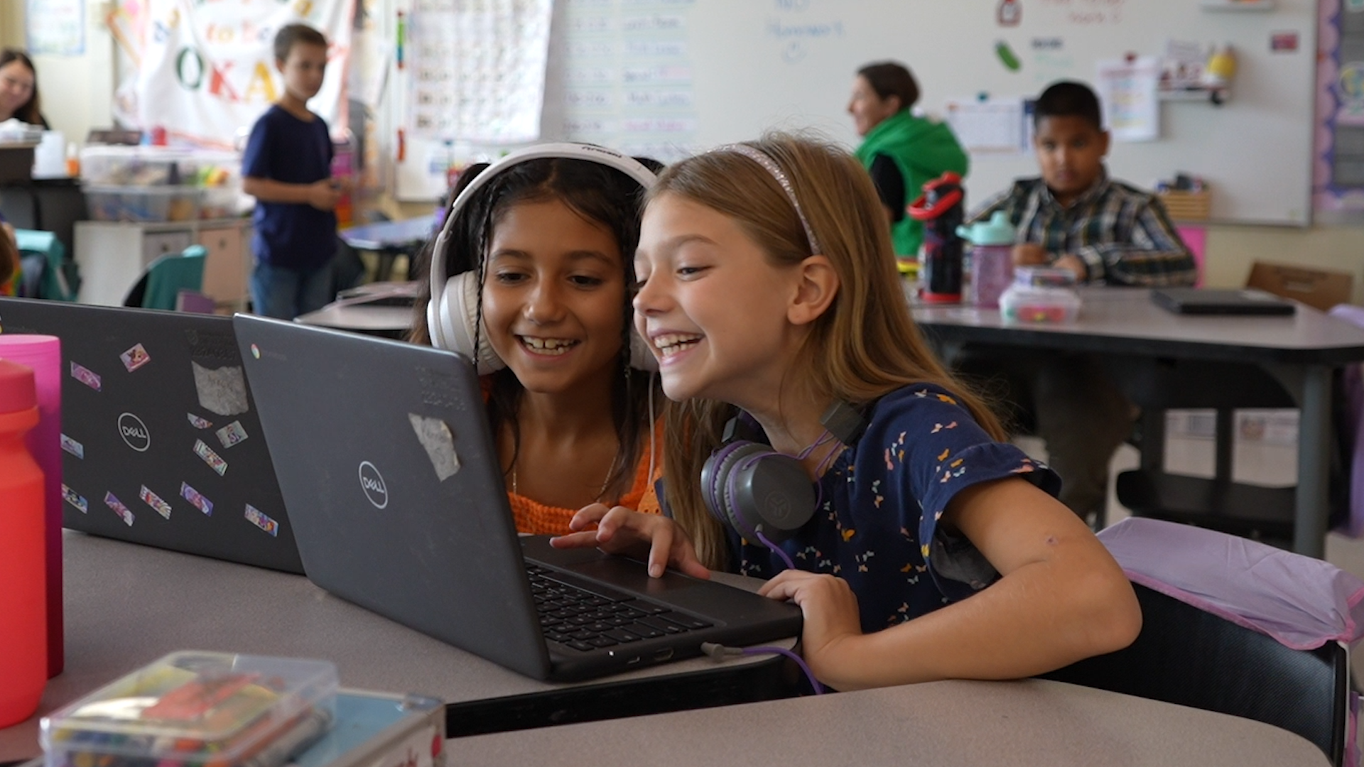 Students work on Chromebook